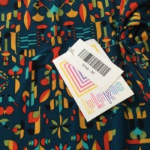 NWT Lularoe Irma Shirt, size Medium. Blue with geometric pattern in red, yellow - Picture 2 of 3